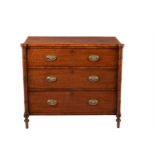 A Regency mahogany and satinwood banded chest of drawers