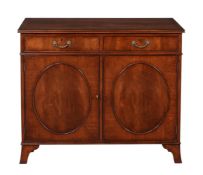 A pair of mahogany side cabinets in George III style