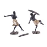 A pair of Austrian cold painted bronze models of African warriors