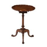 A mahogany tripod table