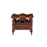 Y An early Victorian rosewood Canterbury