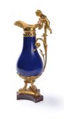 A Louis XVI blue ground Paris porcelain, ormolu and marble mounted ewer