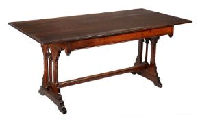 A Victorian oak gothic revival rectangular table