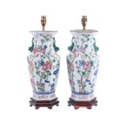 A pair of modern Chinese porcelain hexagonal section famille rose lamp bases