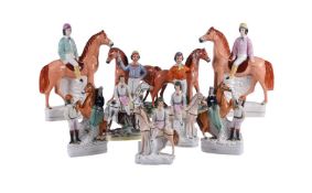 A group of nine various Staffordshire equestrian groups and figures of mostly jockeys