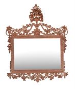 A red stained wood wall mirror in 18th century style