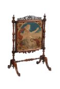 A Victorian mahogany and tapestry fire screen
