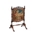 A Victorian mahogany and tapestry fire screen