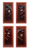 Y A set of four lacquered and mother of pearl inset panels