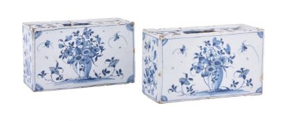 A pair of English delft blue and white flower bricks