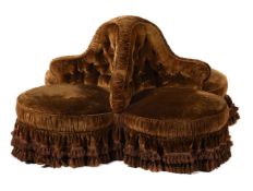 A Victorian mahogany and upholstered conversation seat