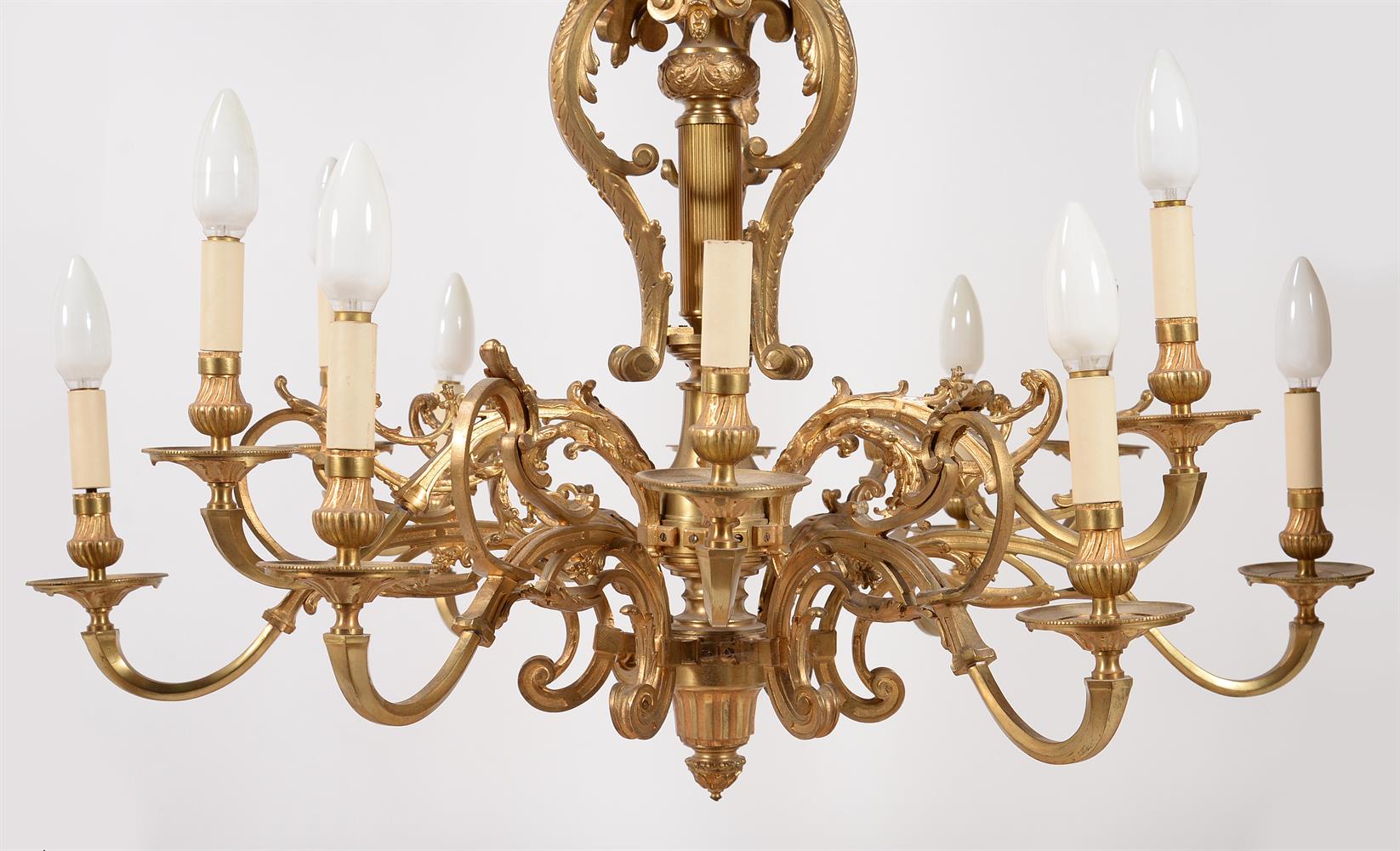 A twelve light brass and gilt chandelier in French taste - Image 3 of 3