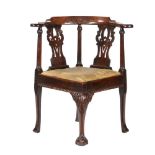 A George II mahogany corner chair