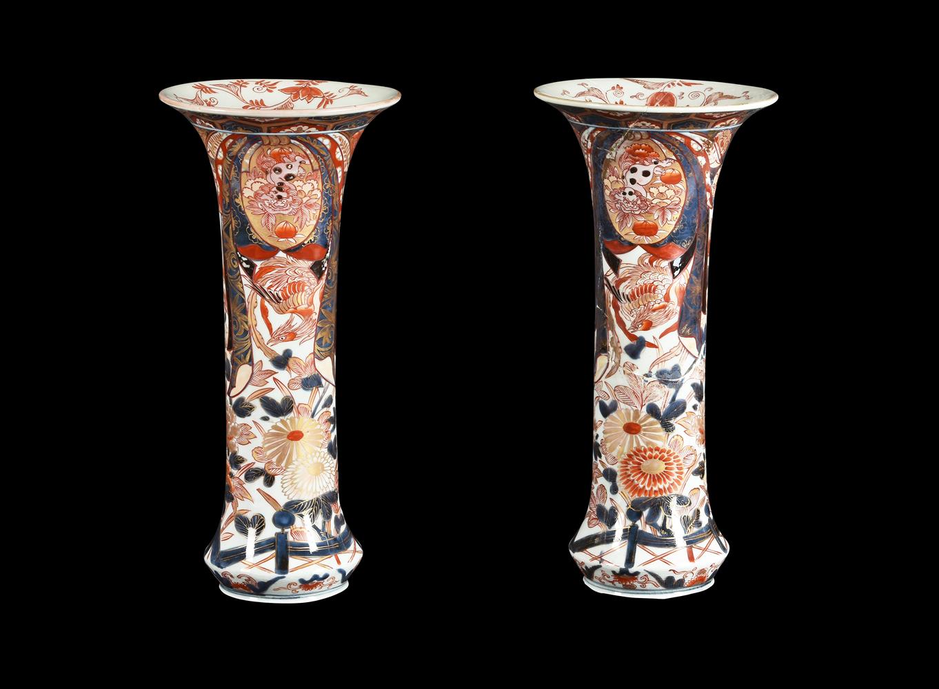 A pair of Japanese Imari trumpet vases