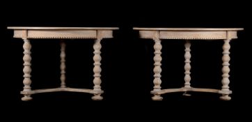 A pair of modern limed oak demi-lune console tables