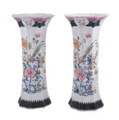 A large pair of Famille Rose beaker vases