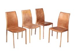 A set of four faux leather clad dining chairs