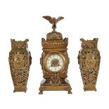 A French lacquered brass mantel clock
