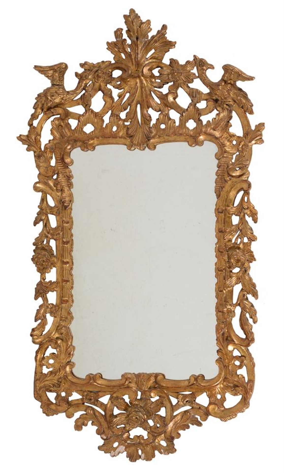 A Continental carved giltwood wall mirror in Baroque taste