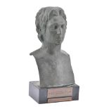 A bronze bust of a classical male figure