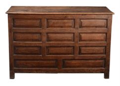 A George III panelled oak chest