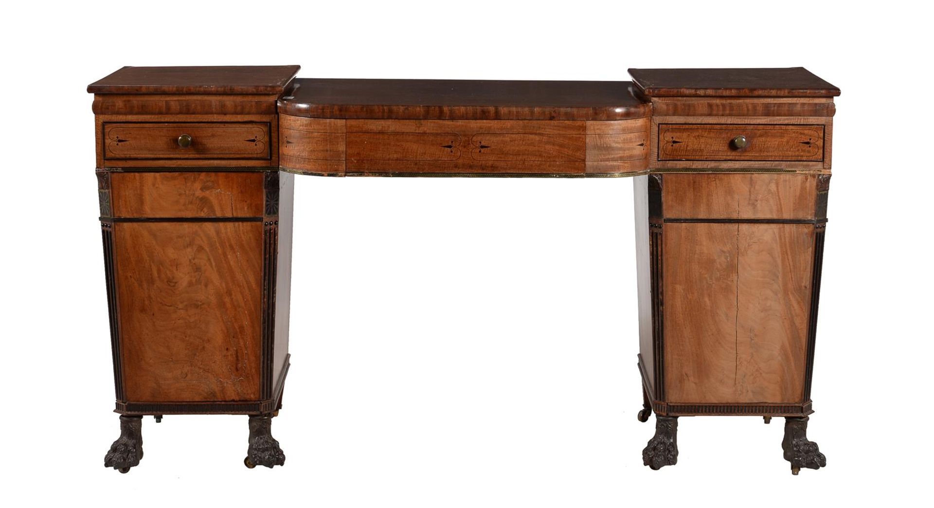 A Regency mahogany and ebonised pedestal sideboard