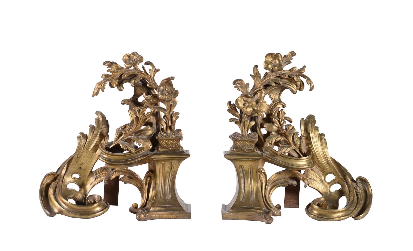 A pair of gilt metal chenets