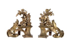 A pair of gilt metal chenets