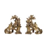 A pair of gilt metal chenets