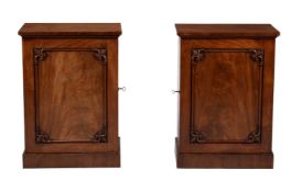 A pair of William IV mahogany side cabinets