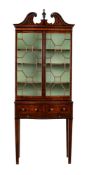 A mahogany, satinwood banded, and line inlaid display cabinet on stand