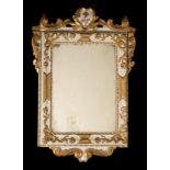 A Continental cream painted and parcel gilt wall mirror