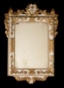 A Continental cream painted and parcel gilt wall mirror