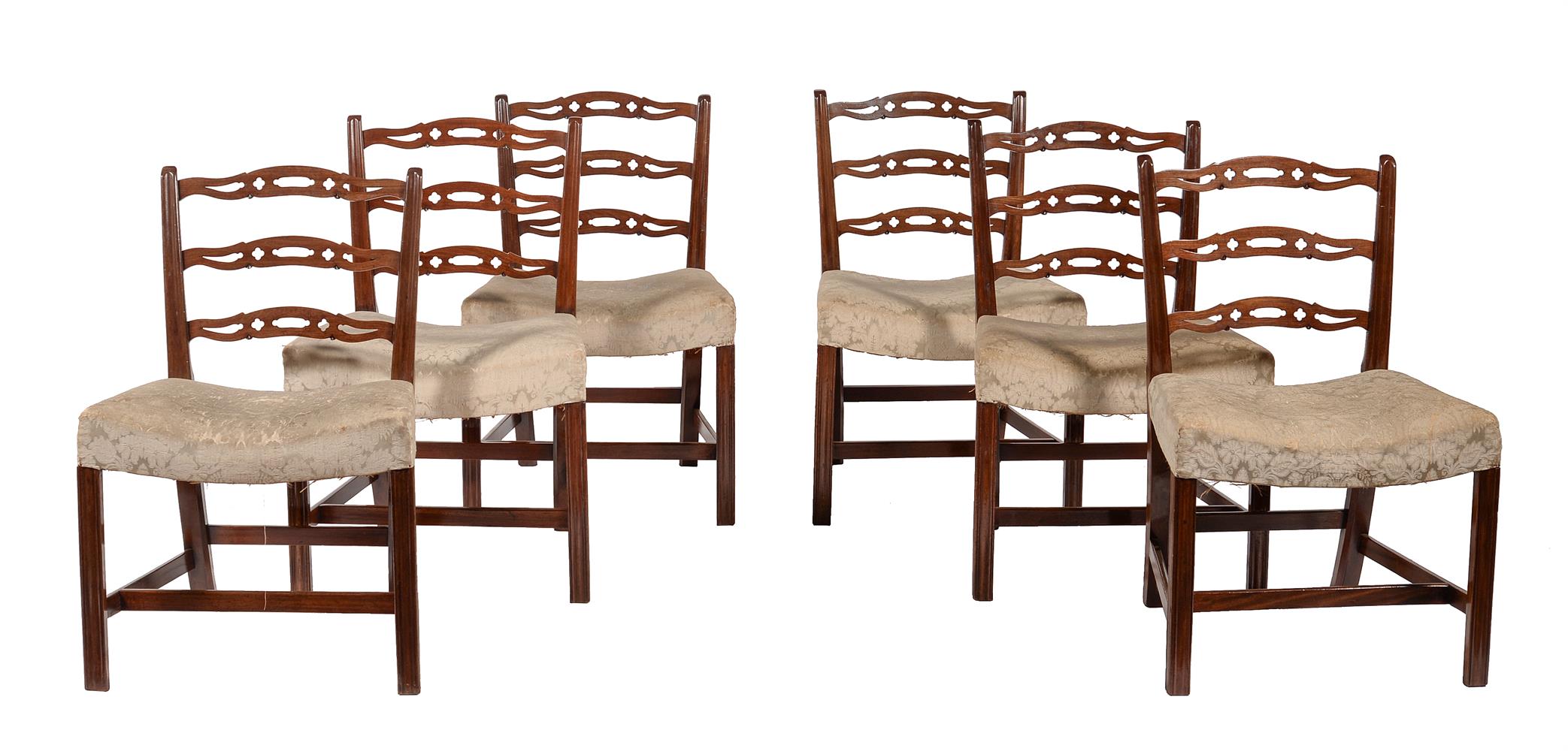 A set of six George III mahogany 'short' ladder back side chairs
