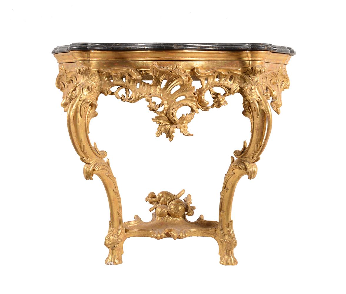 A giltwood console table in rococo style