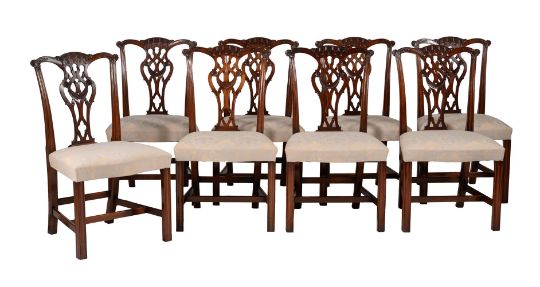 A set of sixteen mahogany dining chairs
