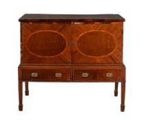 A George III mahogany and crossbanded chest on stand