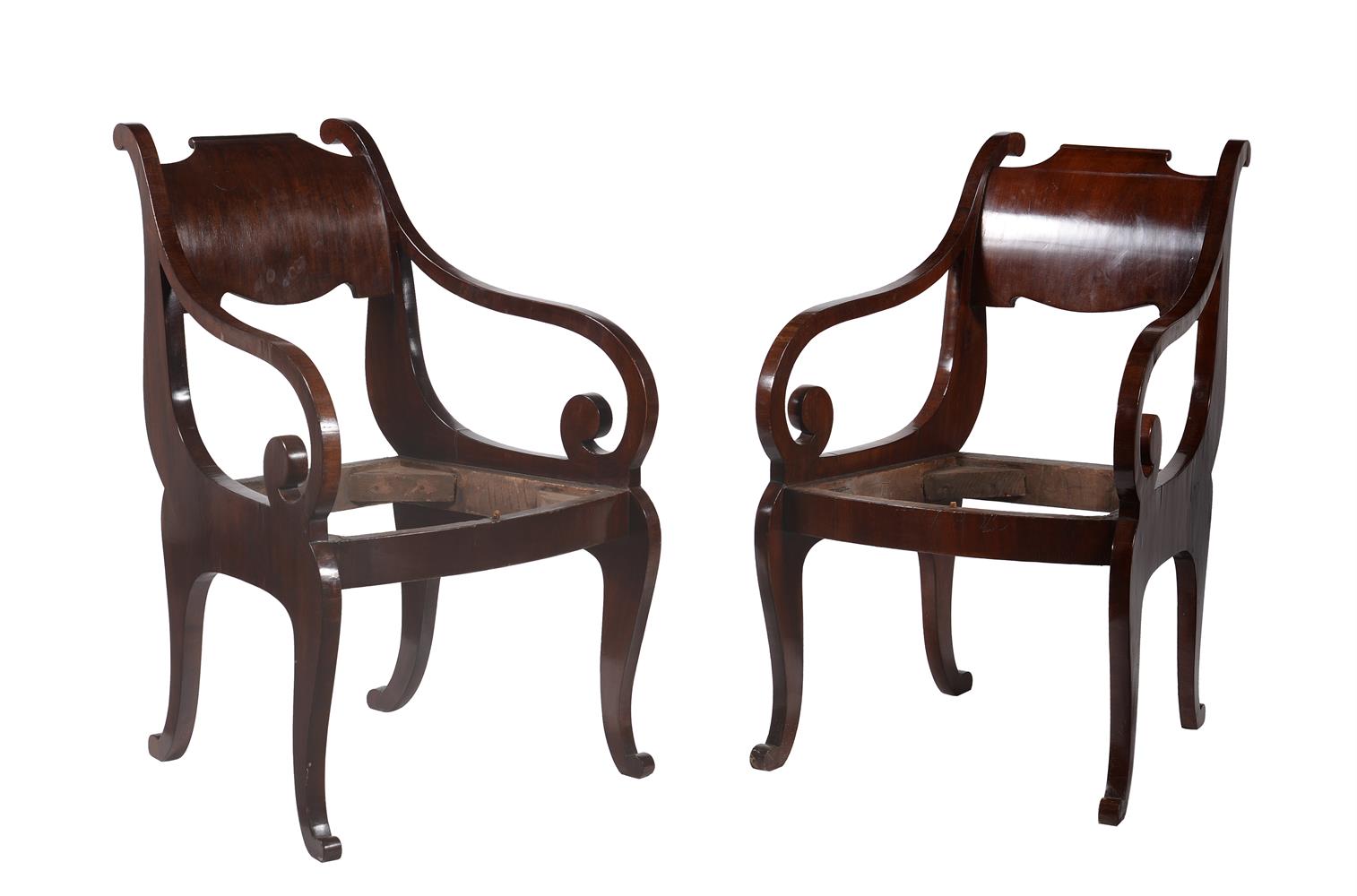 A pair of Continental mahogany armchairs