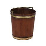 A George III mahogany and brass bound peat bucket