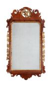 A George III walnut and parcel gilt mirror