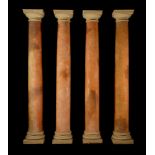 A set of four composite simulated marble columns