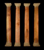 A set of four composite simulated marble columns
