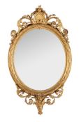 A Victorian giltwood and composition oval wall mirror