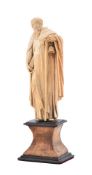 Y A carved ivory model of a saint