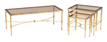 A nest of three gilt metal occasional tables