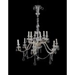 A cut and moulded glass twelve light chandelier