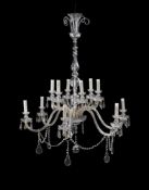 A cut and moulded glass twelve light chandelier
