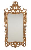 A carved giltwood wall mirror in George II style