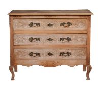 A French oak commode in Louis XVI style