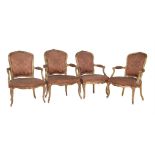 A harlequin set of four Louis XV giltwood and upholstered fauteuils